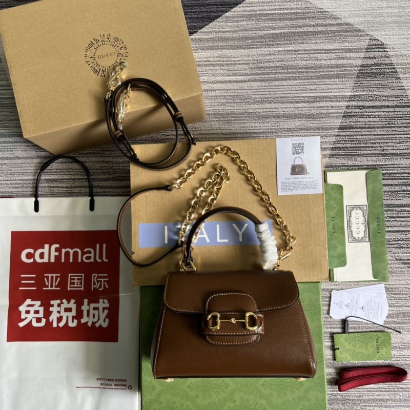 G*u*i top handle bags